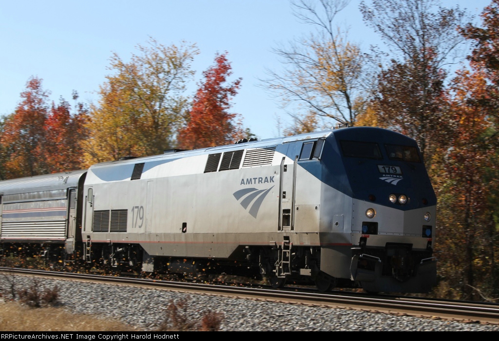 AMTK 179 kicks up the leaves as it heads northbound